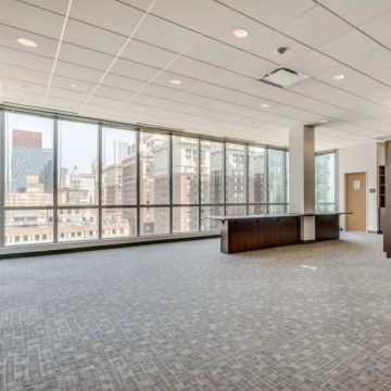 East-West University Chicago, open conference and event space overlooking the city.
