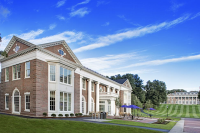 Sunny exterior view of Stonehill College campus.