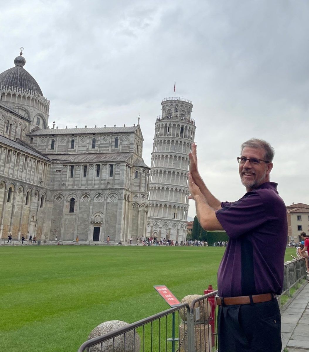 Joel Hauff - UV Staff Member "Holding Up" the Leaning Tower of Pisa