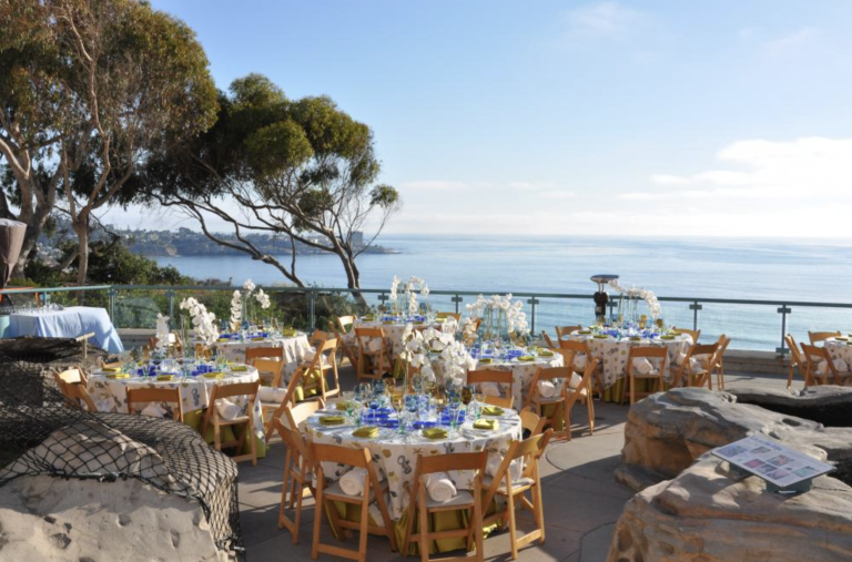 An event setup at the Birch Aquarium of Scripps Institution of Oceanography overlooking the ocean.